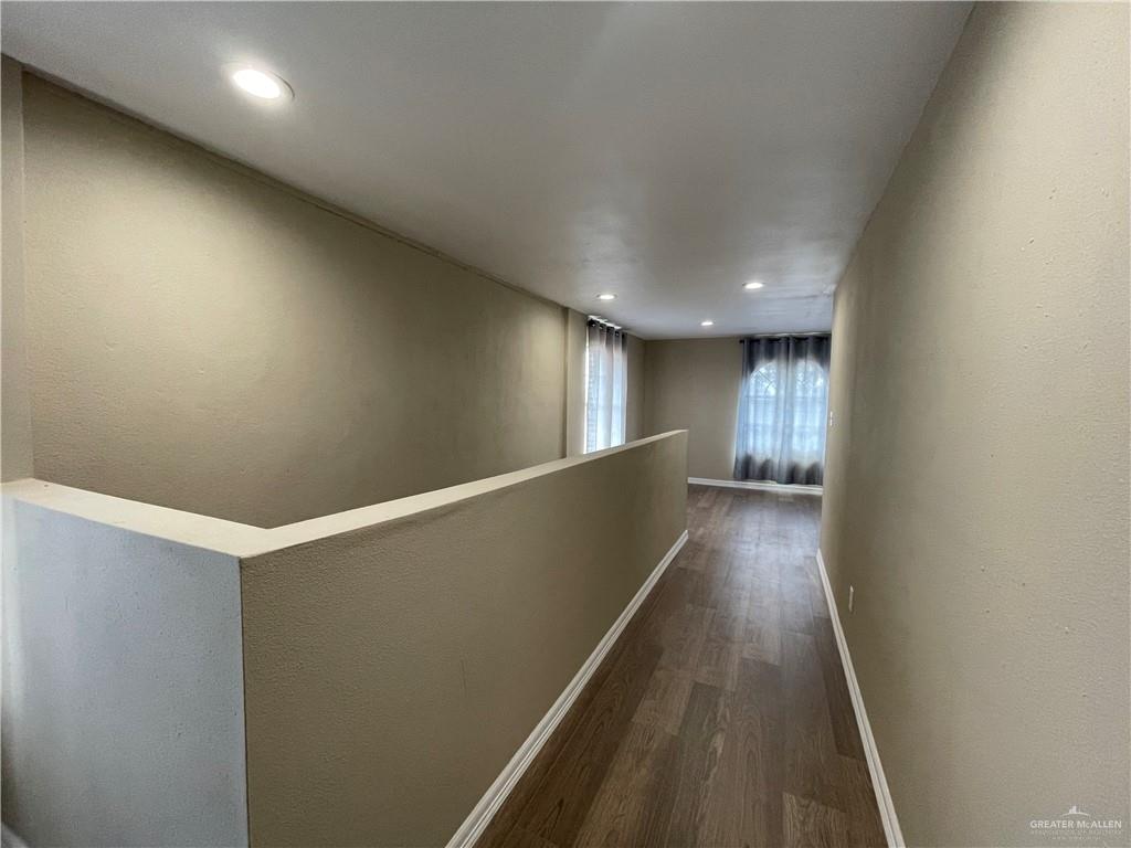 8006 Senecio Street Mission, TX 78574 - Photo 24 of 31 a view of gallery with wooden floor