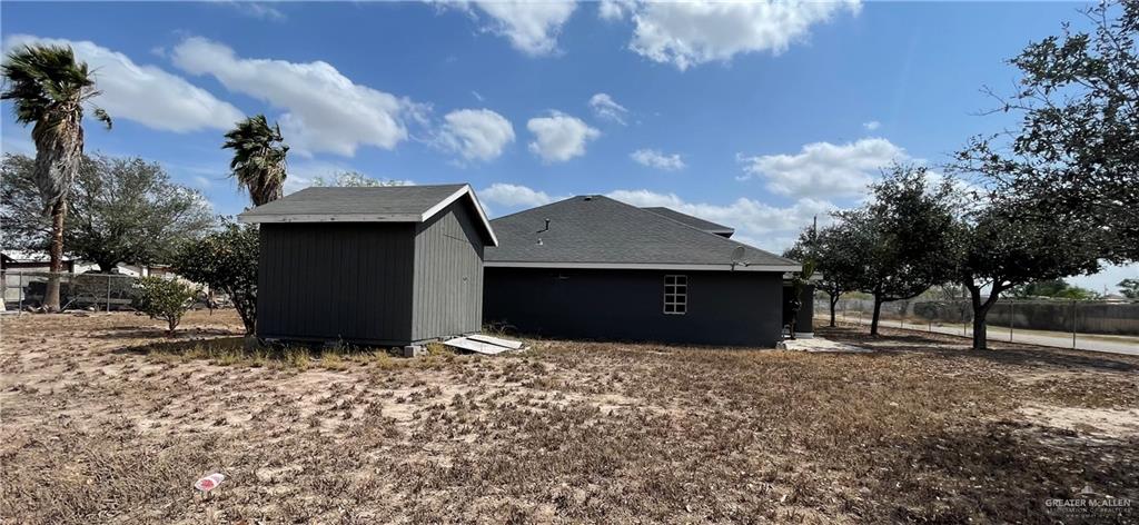 8006 Senecio Street Mission, TX 78574 - Photo 29 of 31 a view of a house with a yard