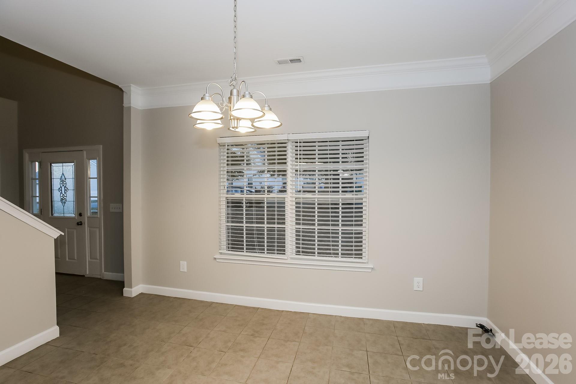 8812 Cornwall Street Locust, NC 28097 - Photo 5 of 15 a view of an empty room with a window