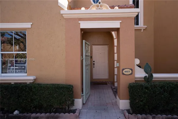 a view of a livingroom from a hallway