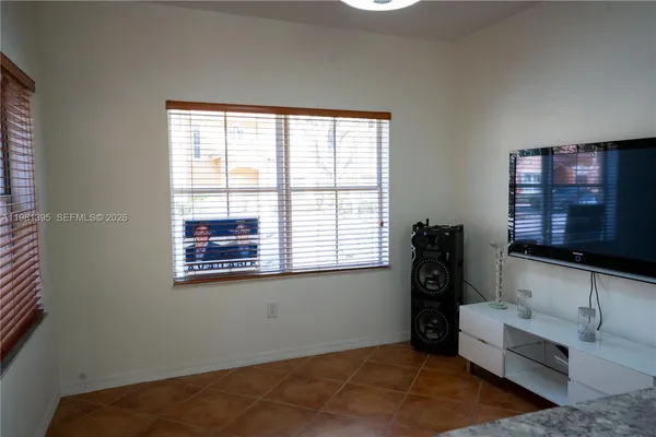 a view of livingroom with furniture and window