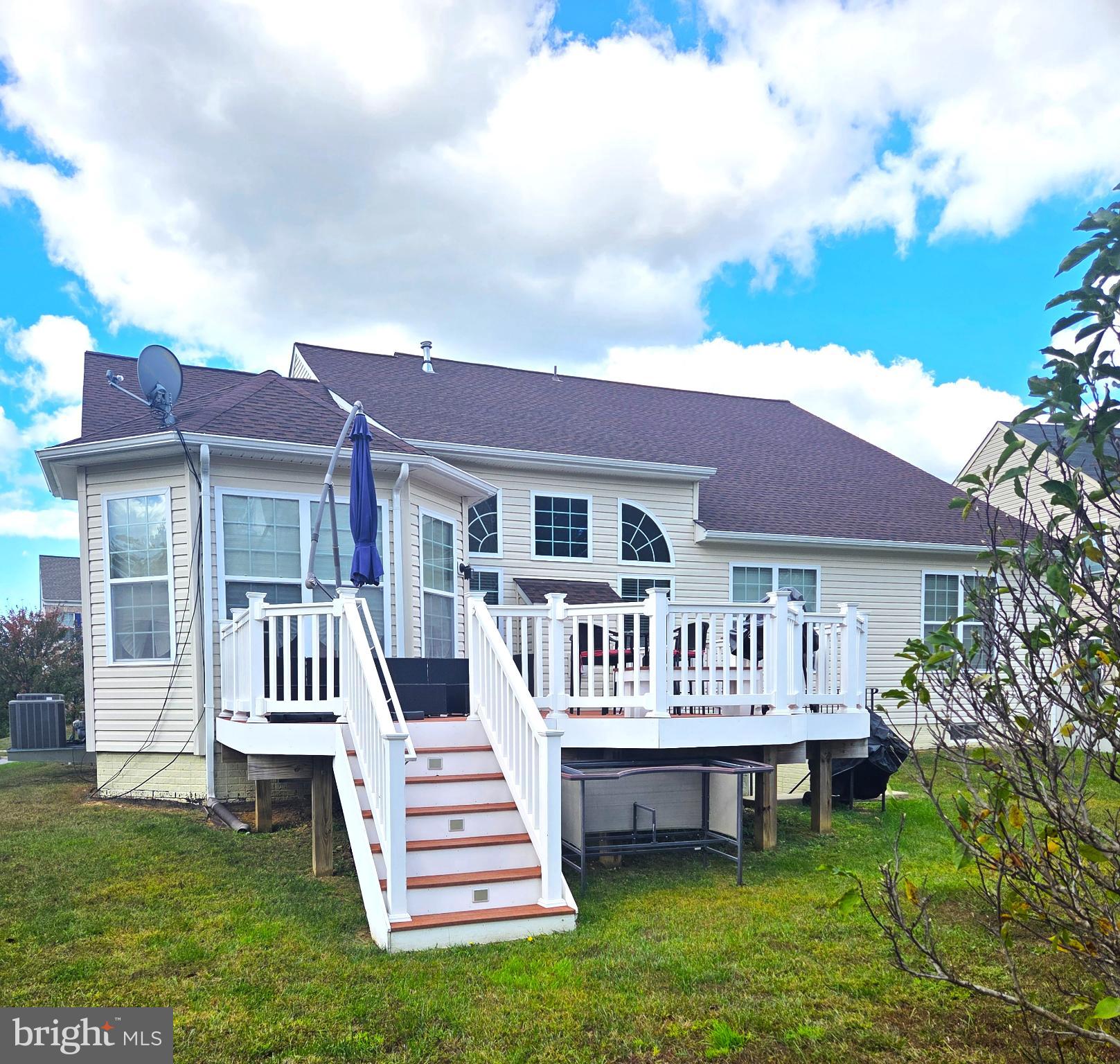 7014 Sand Cherry Way Clinton, MD 20735 - Photo 3 of 6 a view of a house with a yard