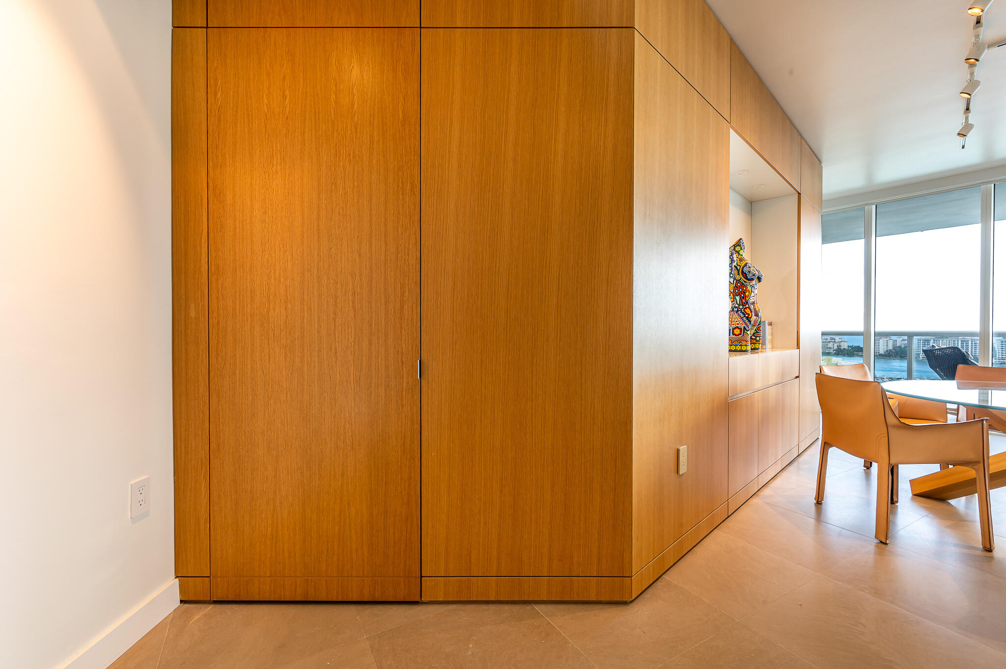400 Alton Road, Unit 1808 Miami Beach, FL 33139 - Photo 8 of 17 a view of a living room hardwood floor and a large window
