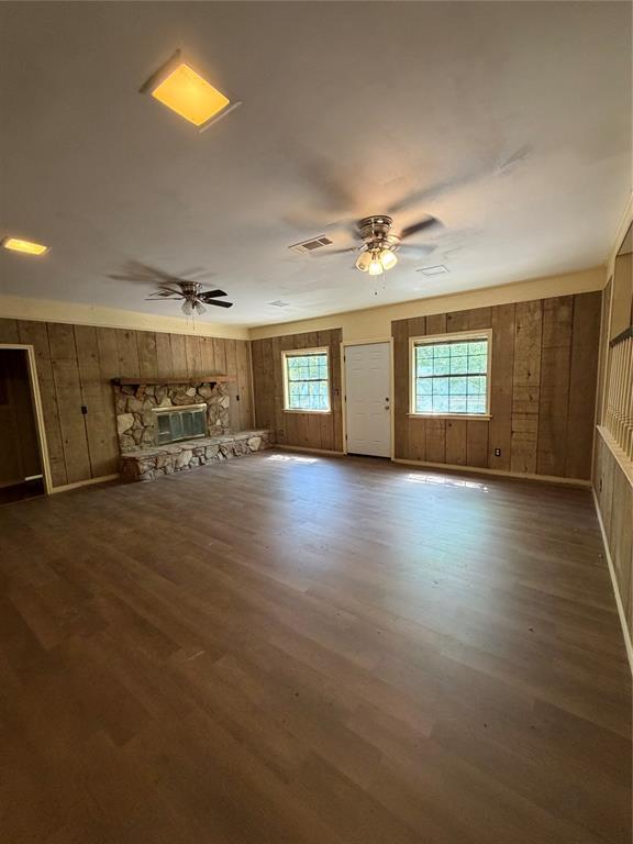 257 West Acres Road Gun Barrel City, TX 75156 - Photo 10 of 22 a view of a livingroom with hardwood floor and a ceiling fan