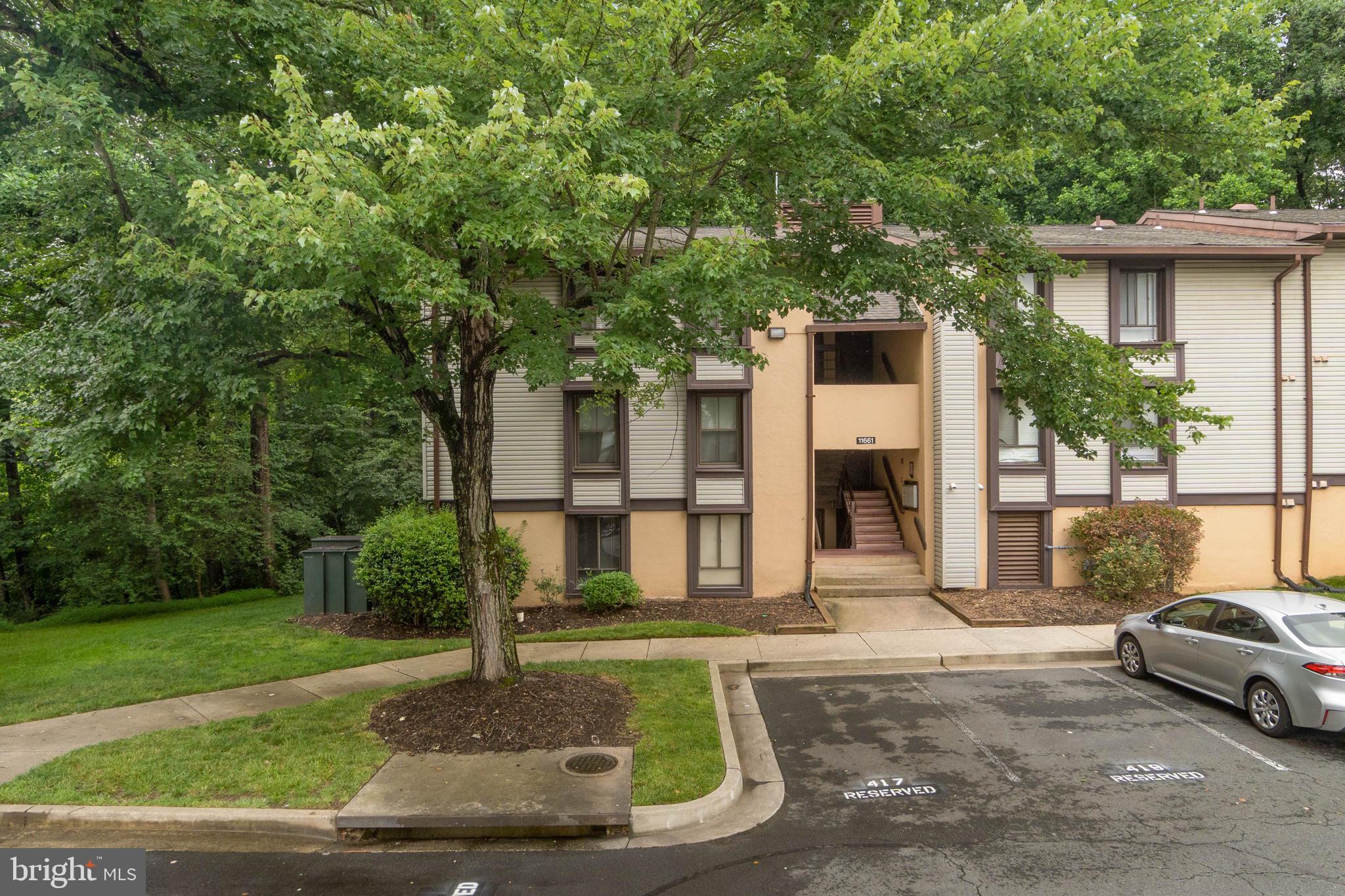 11661 Stoneview Square, Unit 1B Reston, VA 20191 - Photo 1 of 37 Welcome Home! Ground Level Unit Backing to Trees!