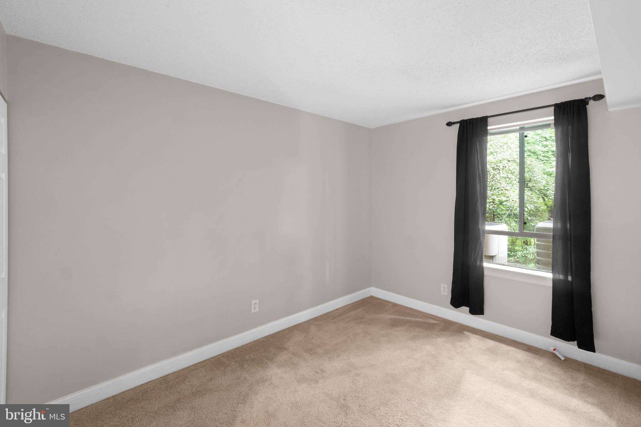 11661 Stoneview Square, Unit 1B Reston, VA 20191 - Photo 11 of 37 Second bedroom.