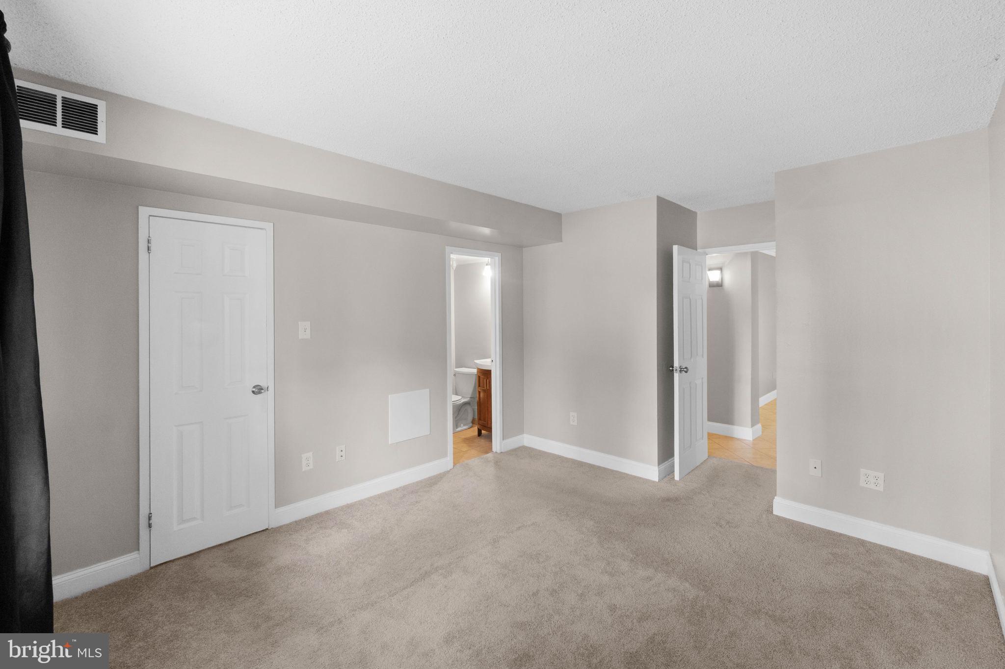 11661 Stoneview Square, Unit 1B Reston, VA 20191 - Photo 16 of 37 Master bedroom.