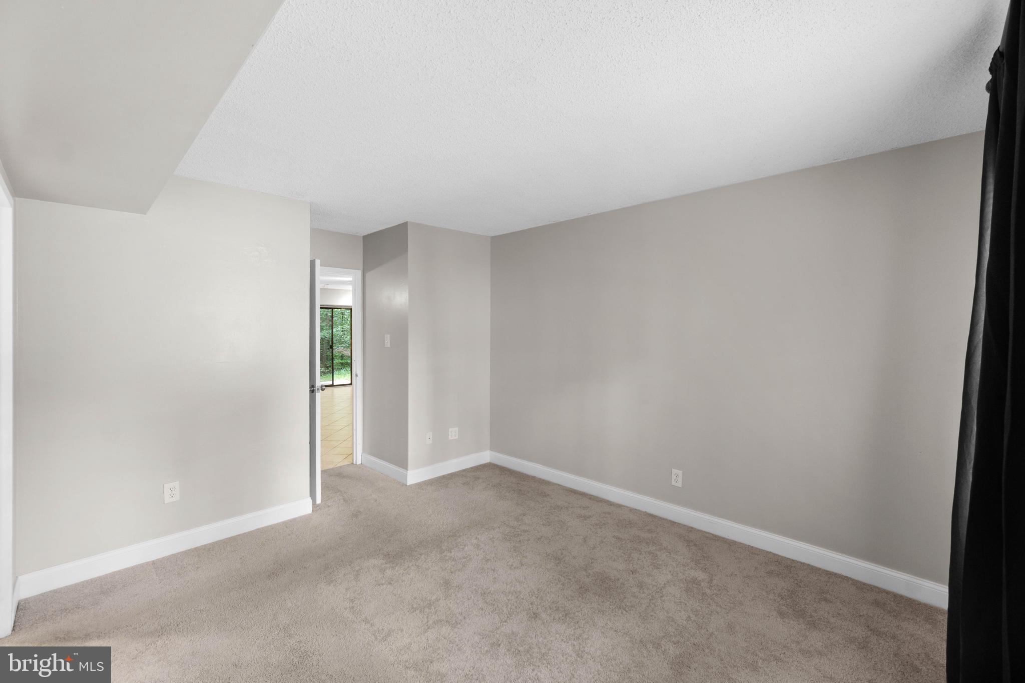 11661 Stoneview Square, Unit 1B Reston, VA 20191 - Photo 17 of 37 Master bedroom.