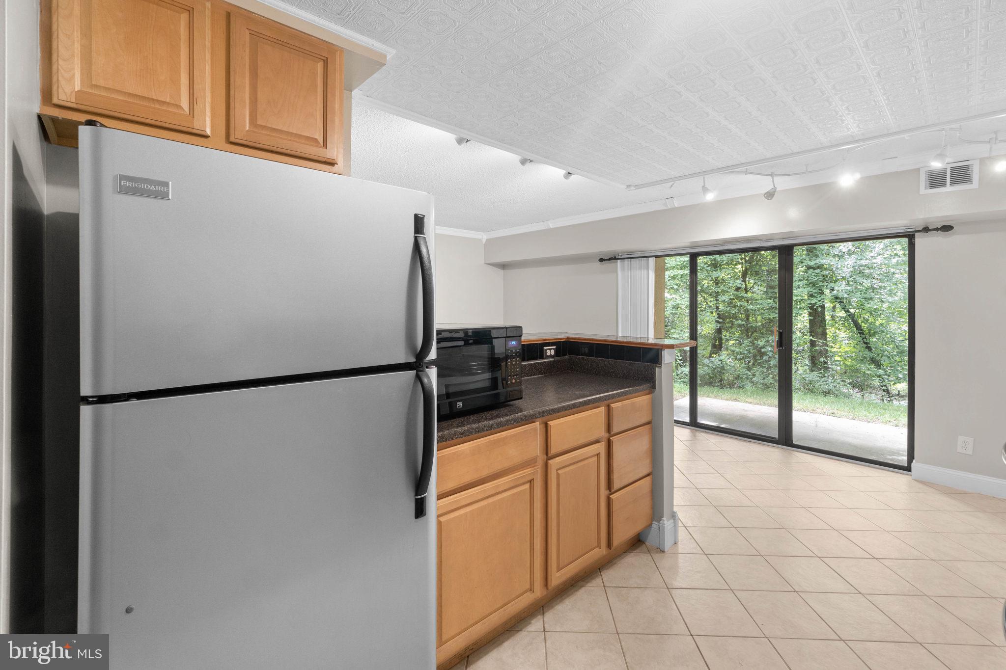 11661 Stoneview Square, Unit 1B Reston, VA 20191 - Photo 3 of 37 Stainless steel refrigerator.