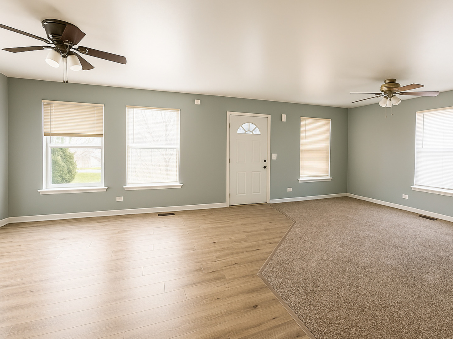 1712 11th Street Waukegan, IL 60085 - Photo 4 of 9 a view of an empty room with a window