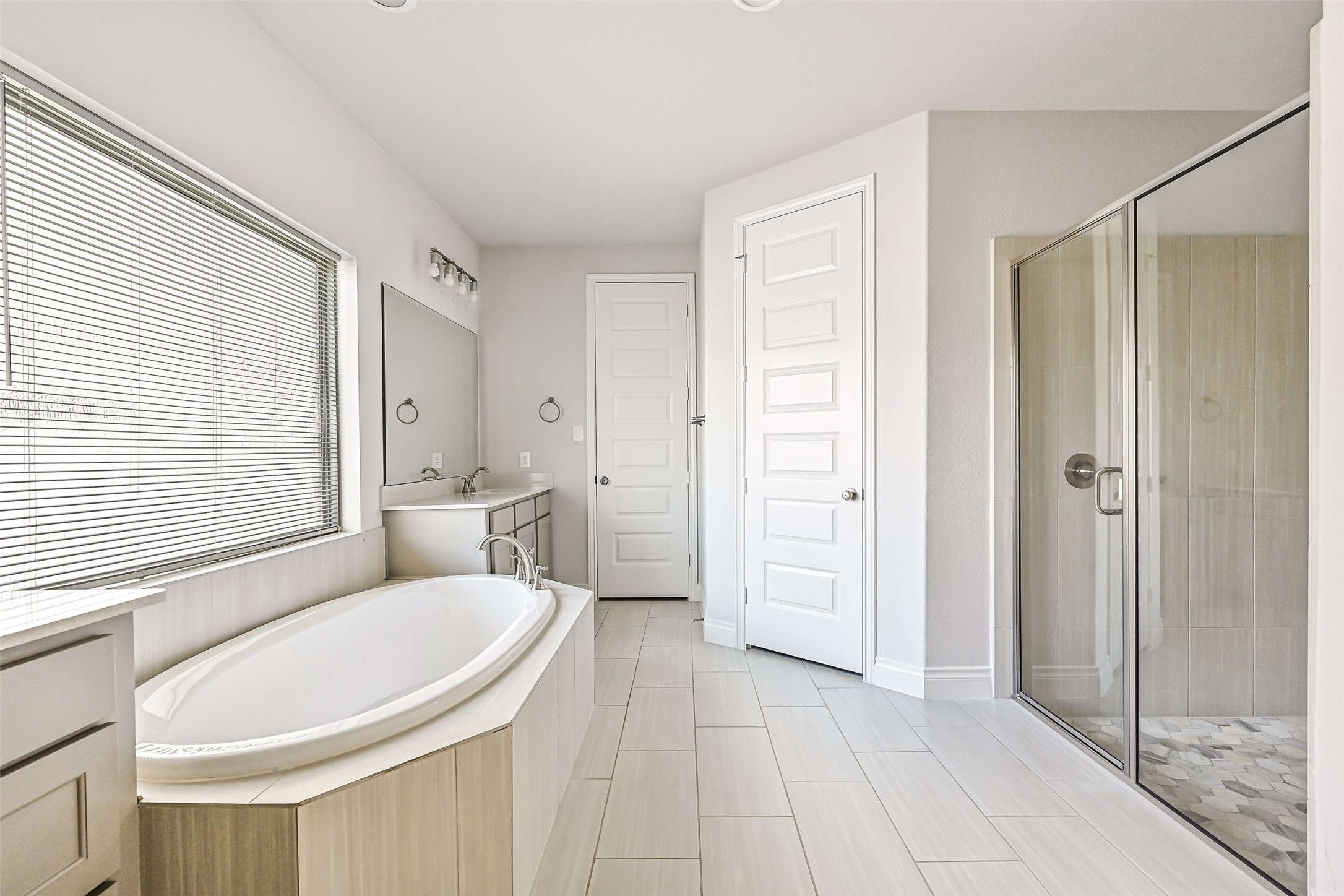 28907 Ridge Valley Court Fulshear, TX 77441 - Photo 19 of 36 a bathroom with a sink a toilet and shower