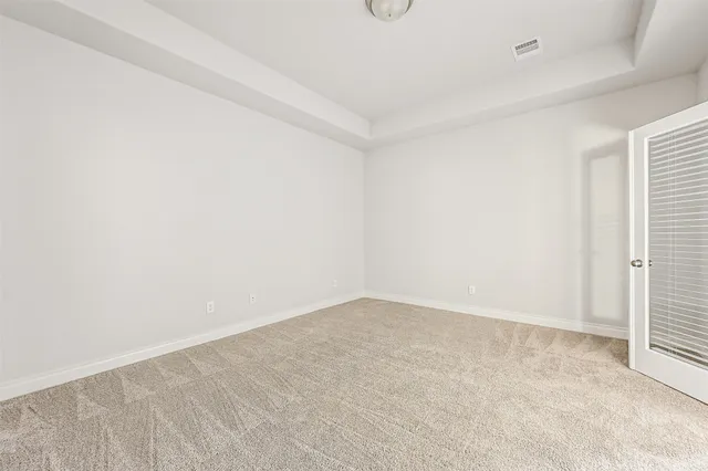 an empty room with an entryway