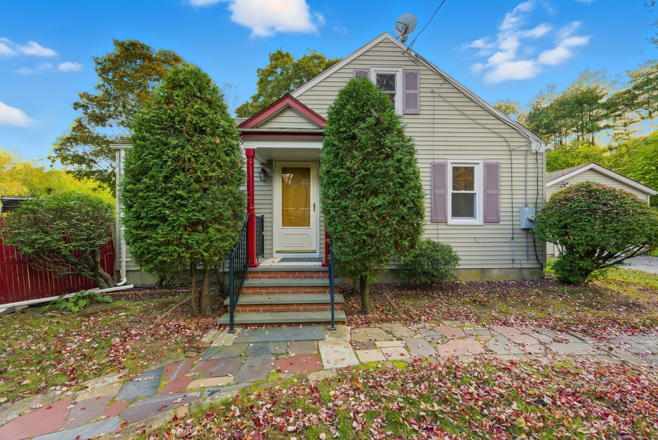 21 Stonington Road Norwich, CT 06360 - Photo 1 of 1 a front view of a house with a yard