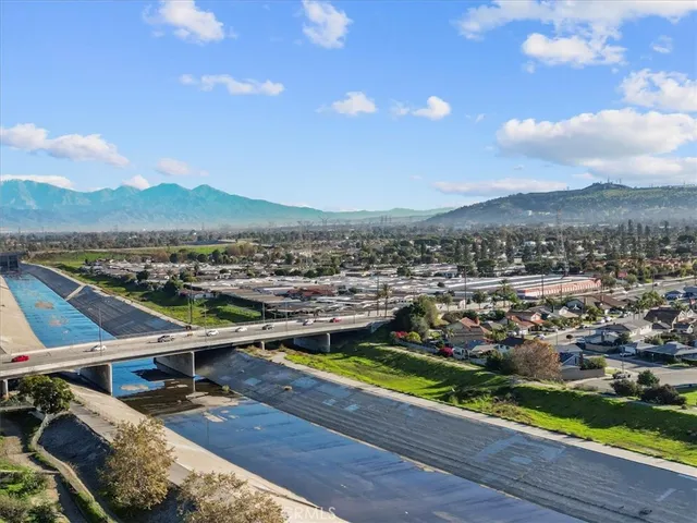 an aerial view of houses with outdoor space