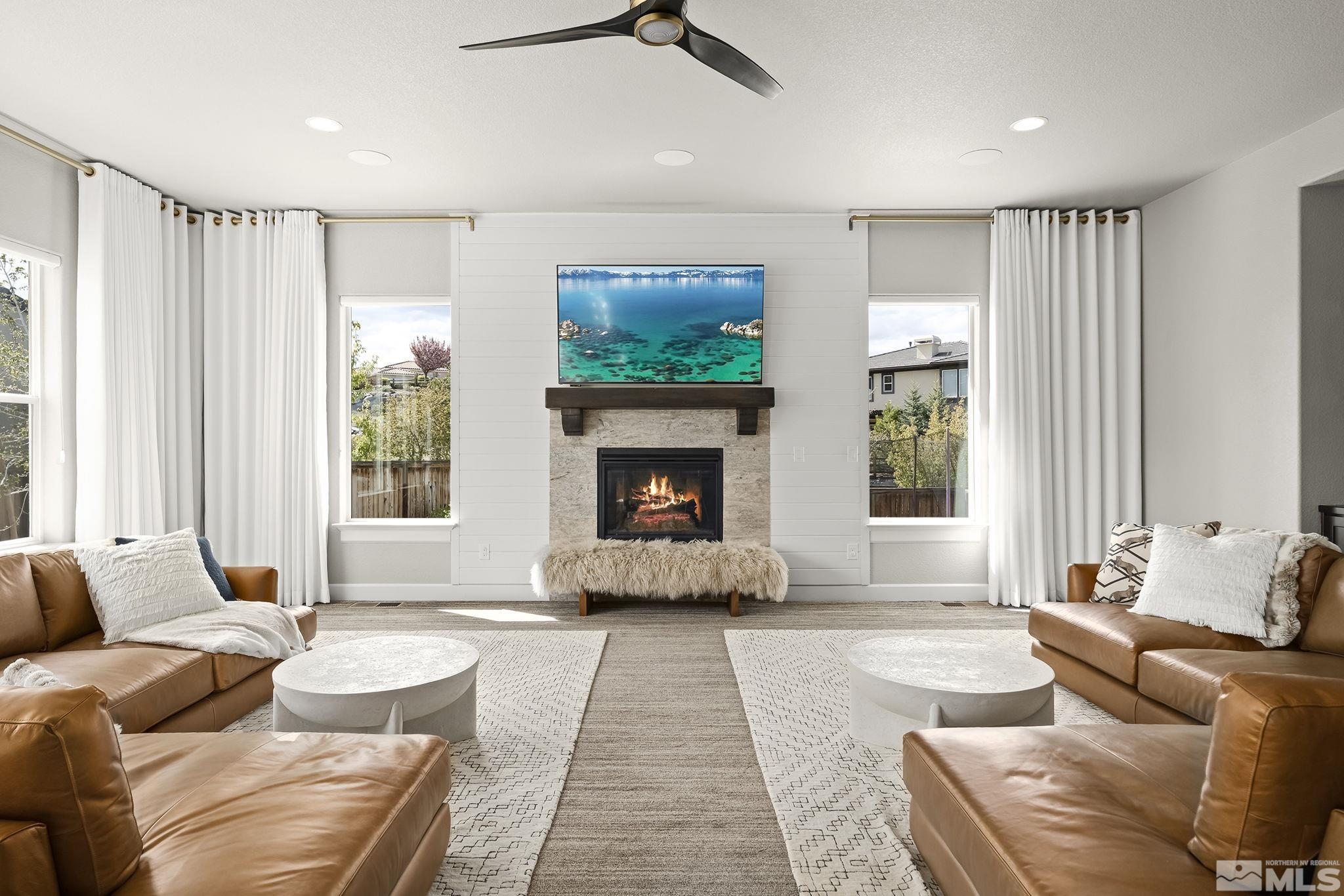 1755 Laurel Ridge Court Reno, NV 89523 - Photo 13 of 38 a living room with furniture and a fireplace