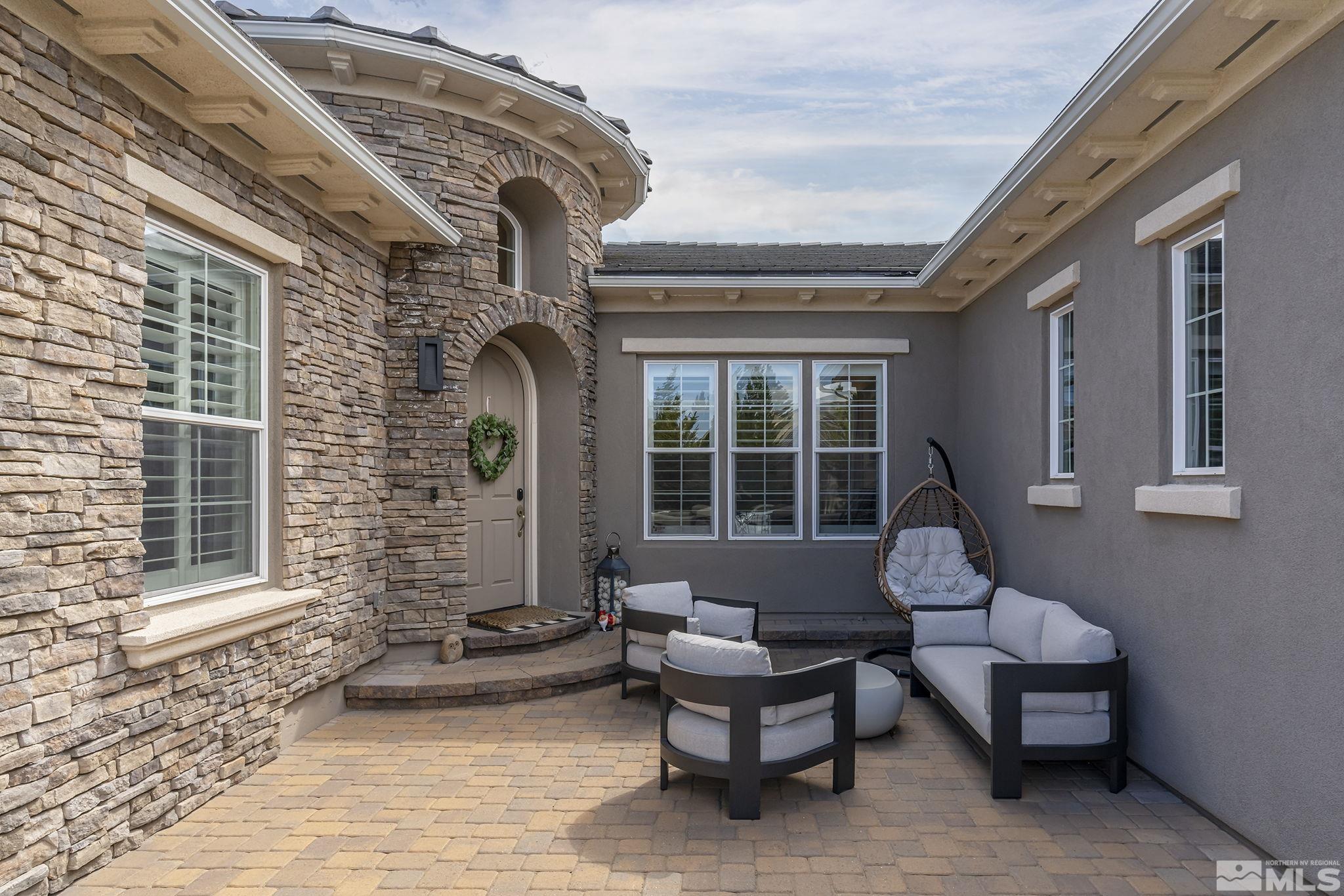 1755 Laurel Ridge Court Reno, NV 89523 - Photo 3 of 38 a building outdoor space with patio furniture
