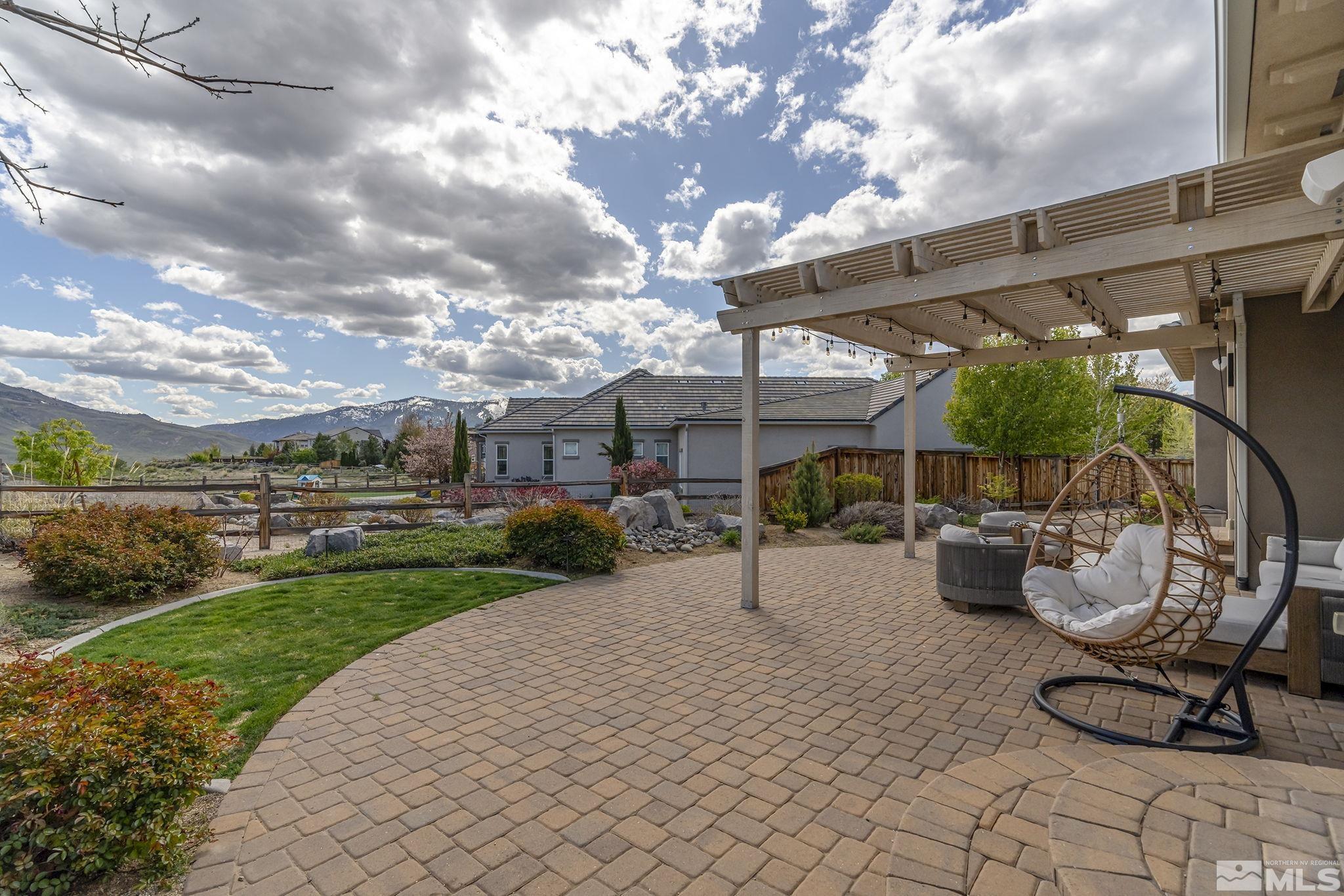 1755 Laurel Ridge Court Reno, NV 89523 - Photo 34 of 38 a view of a backyard with sitting area