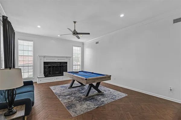 a living room with a couch and a fireplace