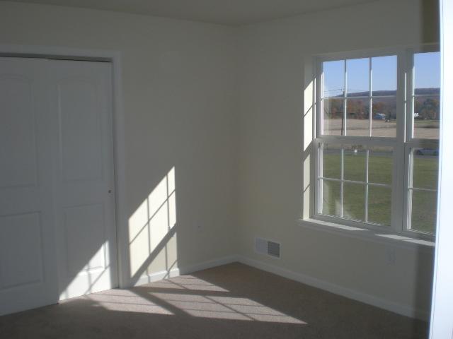 6002 Gilbert Road Gilbert, PA 18331 - Photo 15 of 22 an empty room with windows