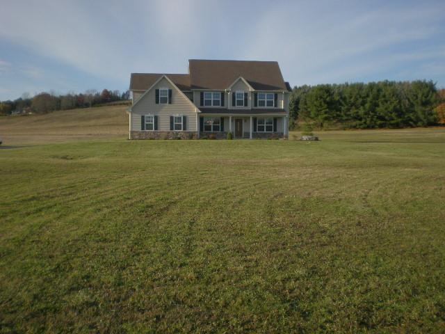 6002 Gilbert Road Gilbert, PA 18331 - Photo 22 of 22 a front view of a house with a yard
