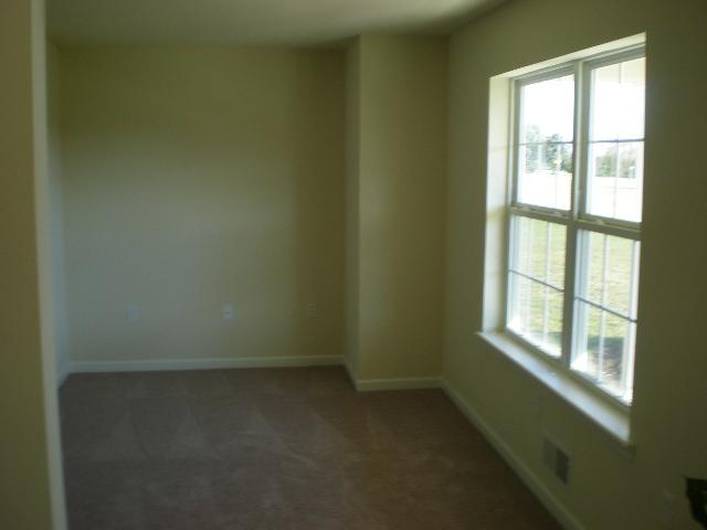 6002 Gilbert Road Gilbert, PA 18331 - Photo 6 of 22 a view of an empty room with a window