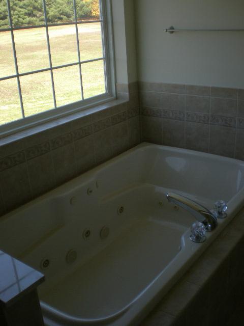 6002 Gilbert Road Gilbert, PA 18331 - Photo 10 of 22 a bathroom with a bathtub