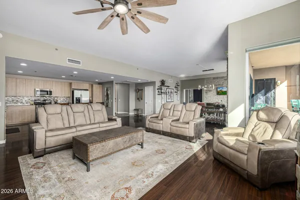 a bathroom with a tub a sink and mirror