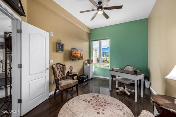 a view of walk in closet and bedroom