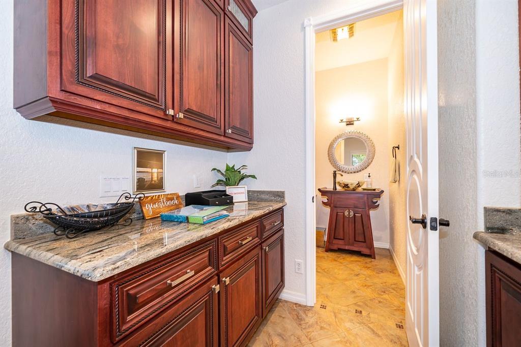 2339 Neptune Road, Unit A Kissimmee, FL 34744 - Photo 14 of 43 a kitchen with granite countertop a sink and a stove