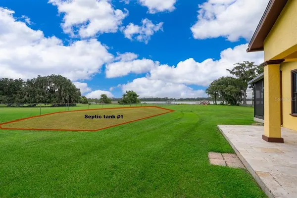 a view of a garden with a fountain