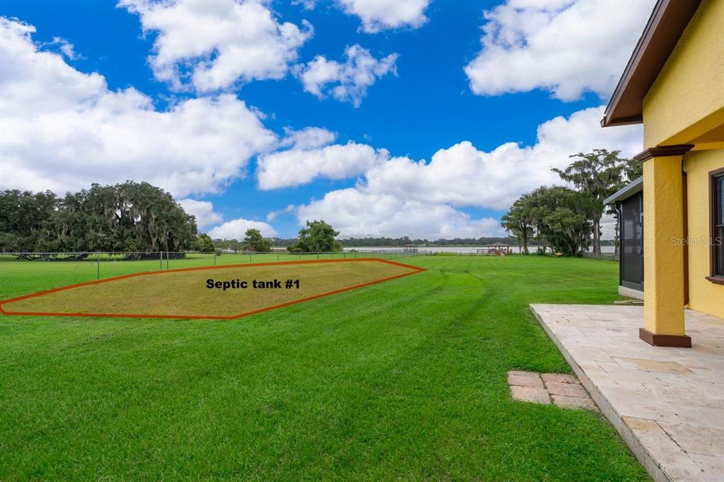 2339 Neptune Road, Unit A Kissimmee, FL 34744 - Photo 38 of 43 a view of a garden with a fountain