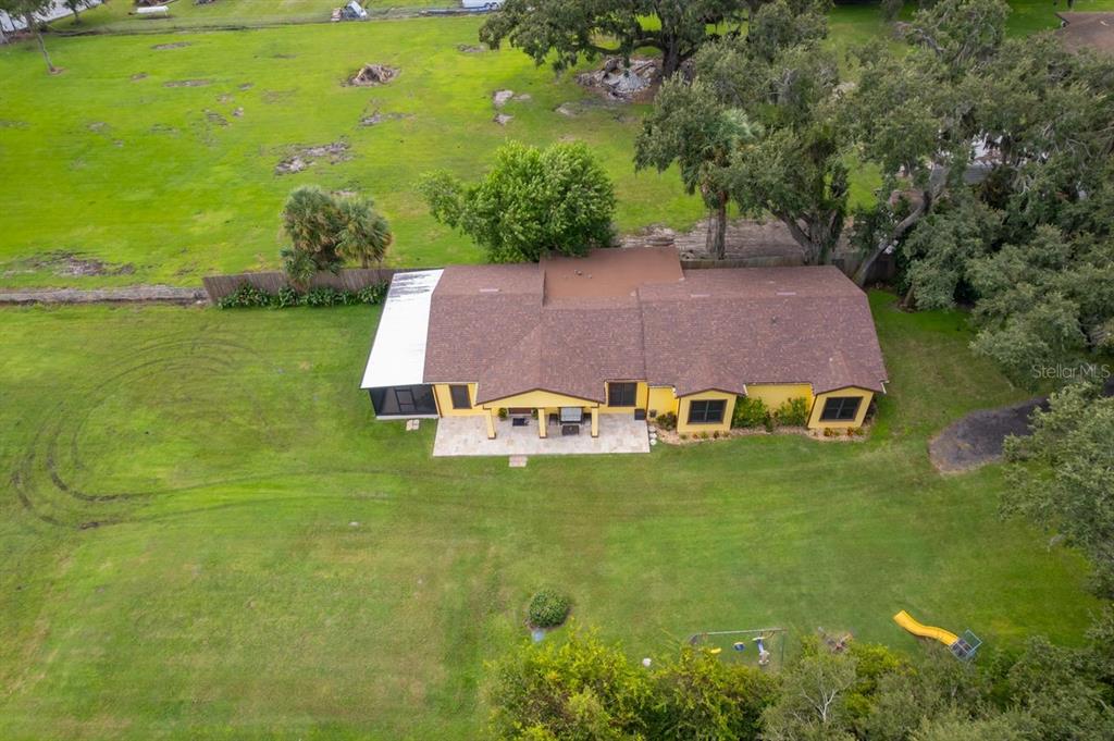 2339 Neptune Road, Unit A Kissimmee, FL 34744 - Photo 39 of 43 a view of a house with a big yard