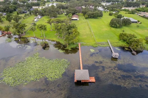 an aerial view of residential house with outdoor space