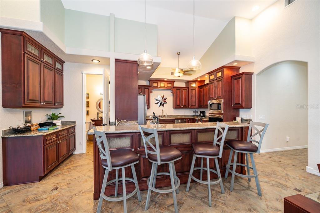 2339 Neptune Road, Unit A Kissimmee, FL 34744 - Photo 9 of 43 a view of a dining room with furniture