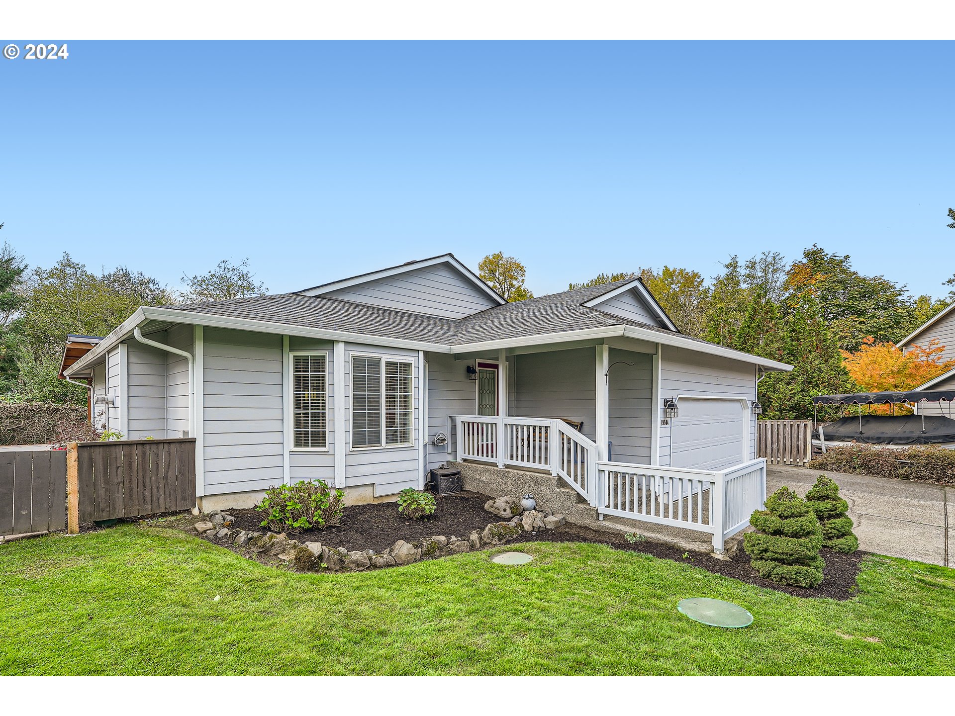 19504 Southeast 41st Circle Camas, WA 98607 - Photo 1 of 27 a front view of a house with a yard