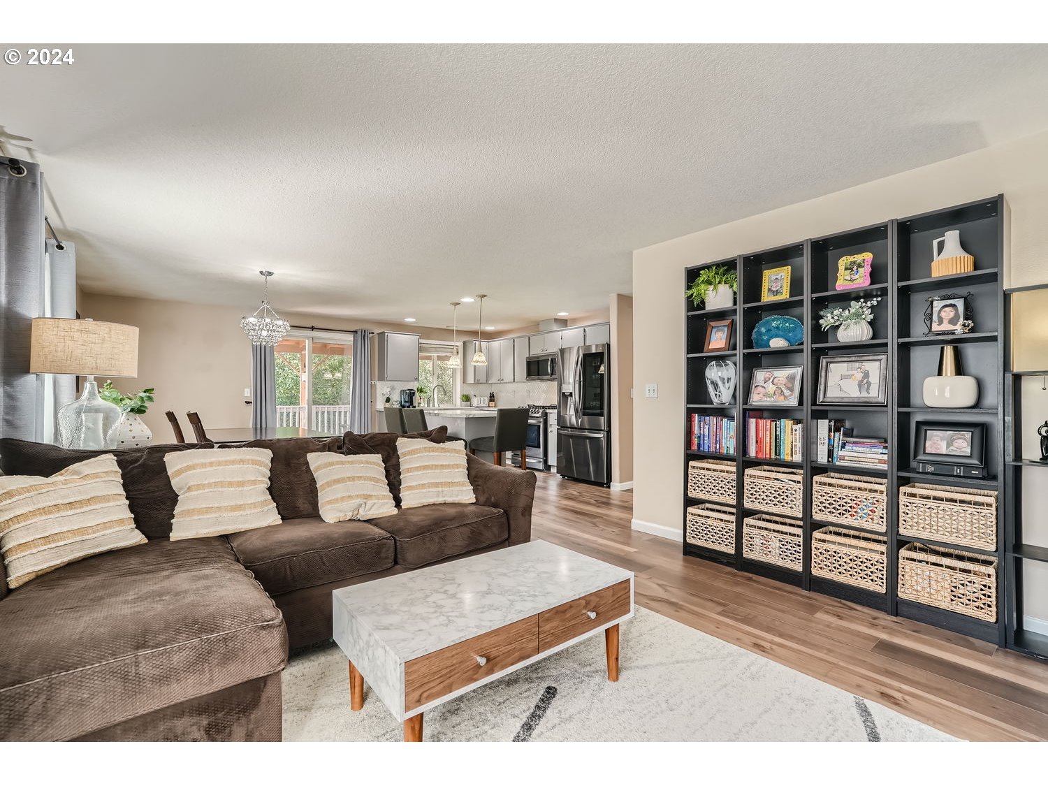 19504 Southeast 41st Circle Camas, WA 98607 - Photo 14 of 27 a living room with furniture and a book shelf