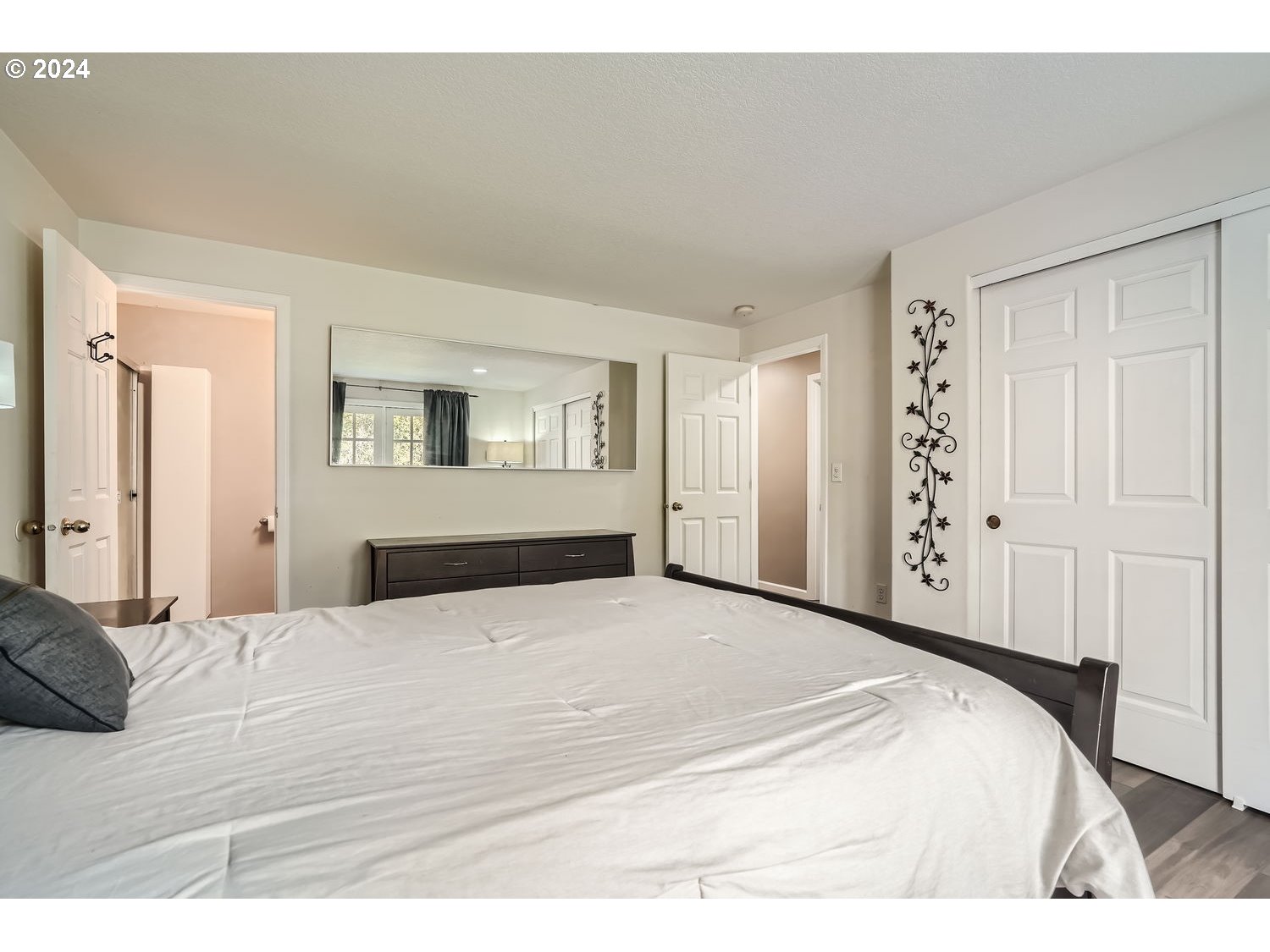 19504 Southeast 41st Circle Camas, WA 98607 - Photo 18 of 27 a large white bed in a white room