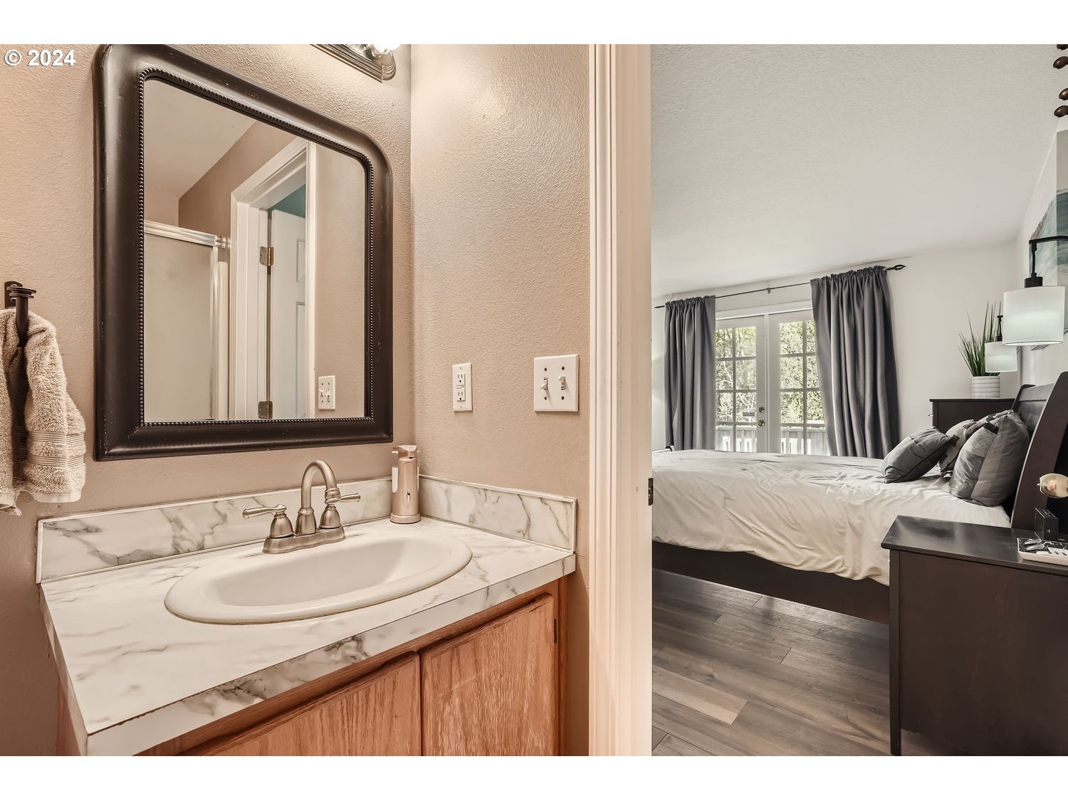 19504 Southeast 41st Circle Camas, WA 98607 - Photo 21 of 27 a en suite bathroom with a sink and a mirror