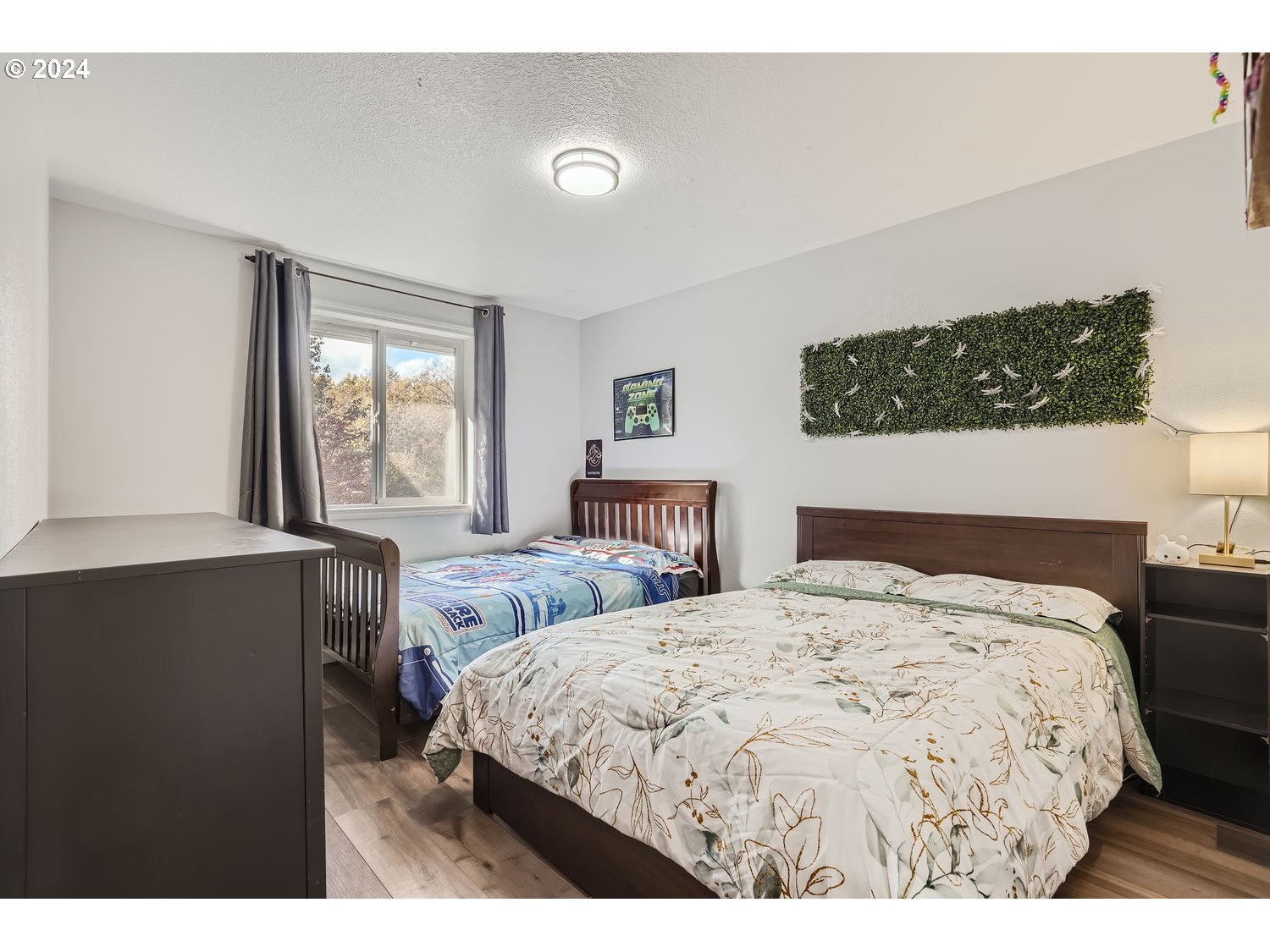 19504 Southeast 41st Circle Camas, WA 98607 - Photo 22 of 27 a bedroom with two beds and a window