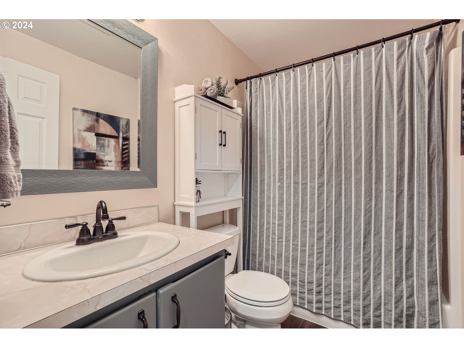 19504 Southeast 41st Circle Camas, WA 98607 - Photo 24 of 27 a bathroom with a sink toilet and shower