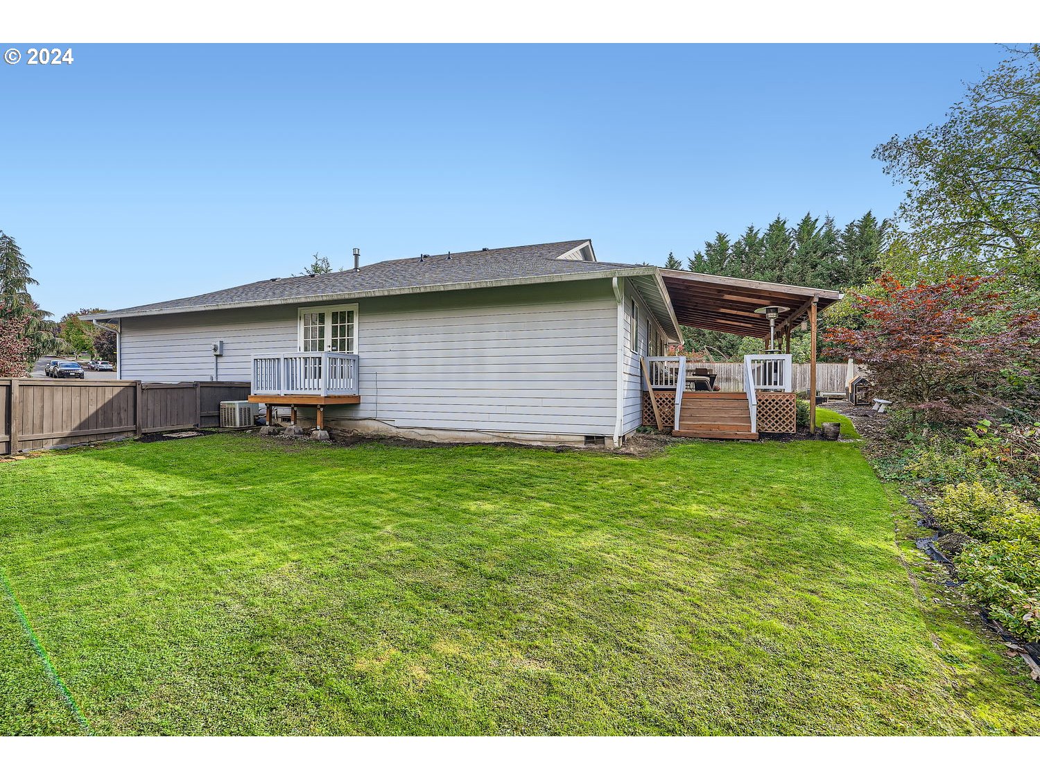 19504 Southeast 41st Circle Camas, WA 98607 - Photo 27 of 27 a view of a house with a backyard