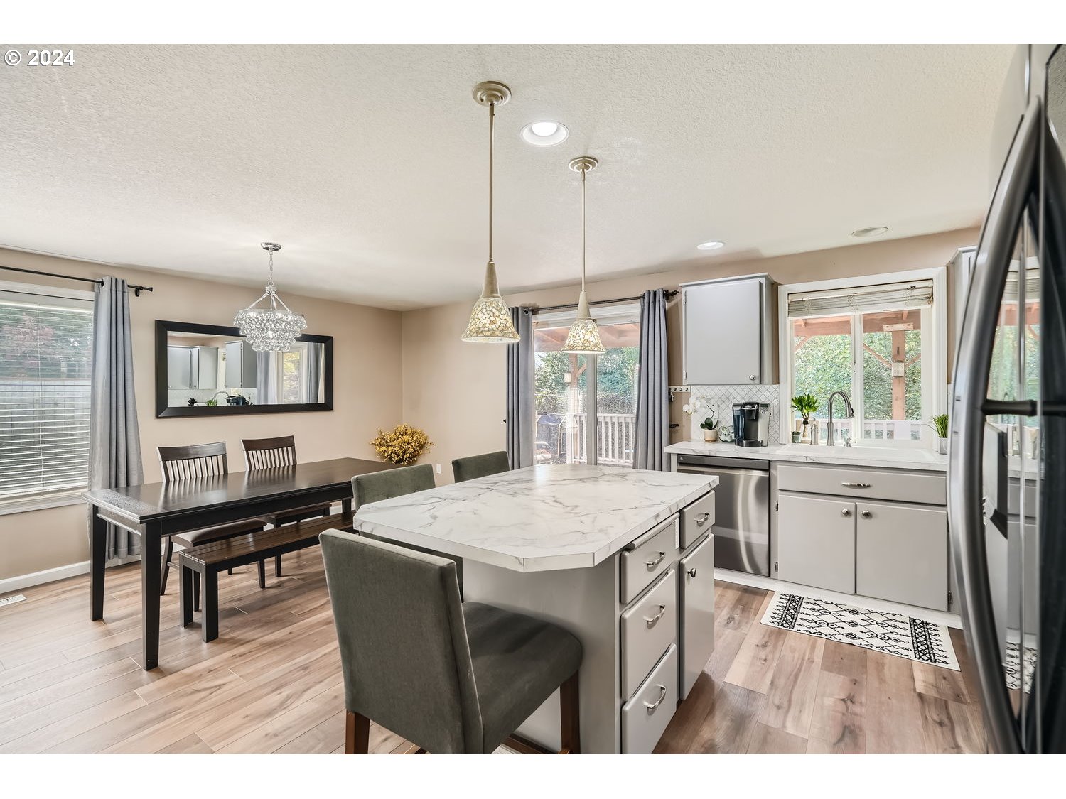 19504 Southeast 41st Circle Camas, WA 98607 - Photo 9 of 27 a kitchen with a table and chairs