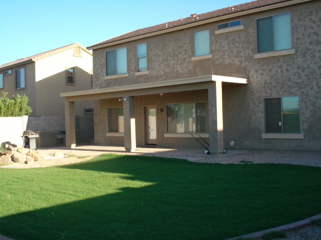 10092 East Hay Loft Road Florence, AZ 85132 - Photo 3 of 40 Back view of home and yard