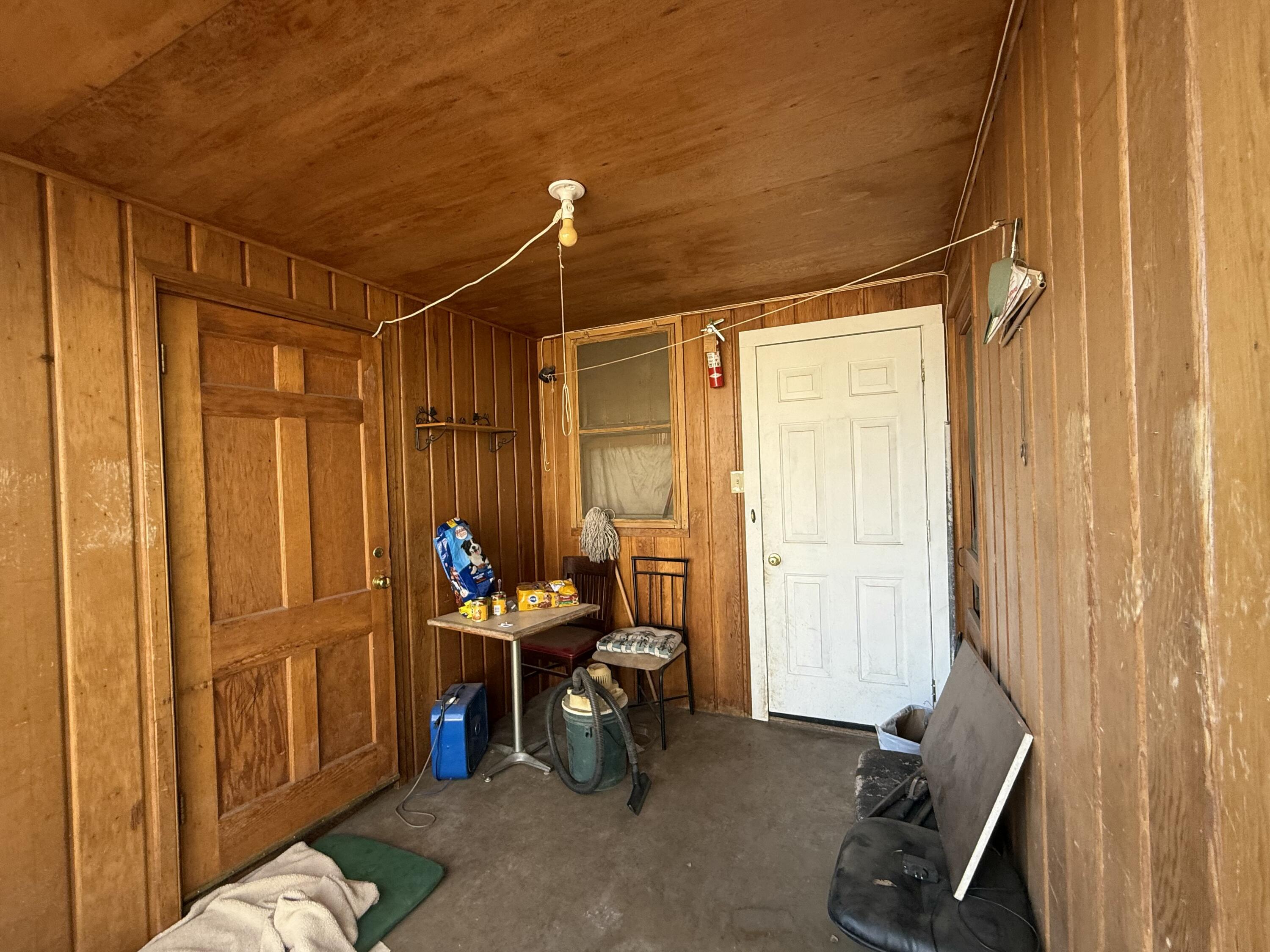 1924 14th Street Lubbock, TX 79401 - Photo 8 of 39 a living room filled with furniture and a window