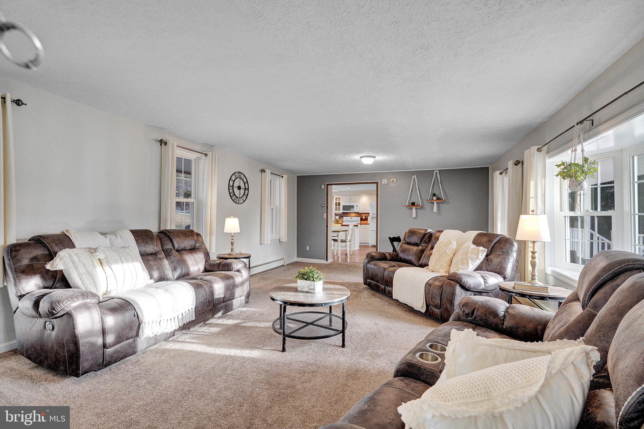 259 A A-Frame Road Coudersport, PA 16915 - Photo 16 of 130 Spacious living room with natural light.