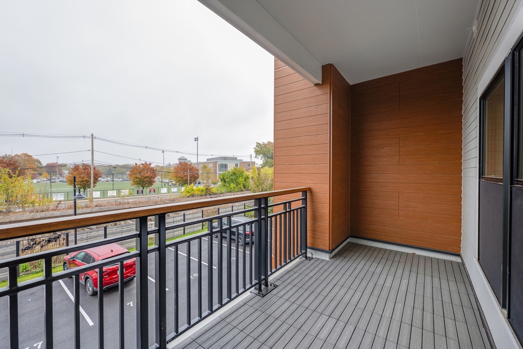 62 Foundry Street, Unit 202 Wakefield, MA 01880 - Photo 11 of 18 a view of city from a balcony