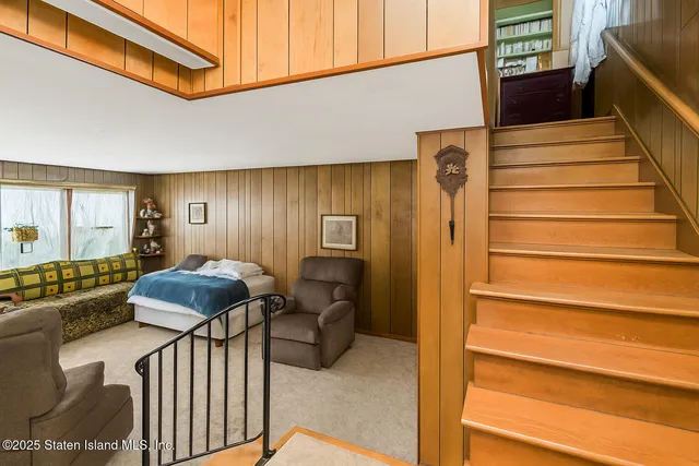 a view of livingroom with furniture and workspace