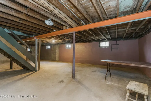 a view of backyard with wooden ceiling fan