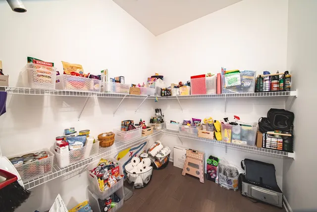a utility room with lots of clutter and toys