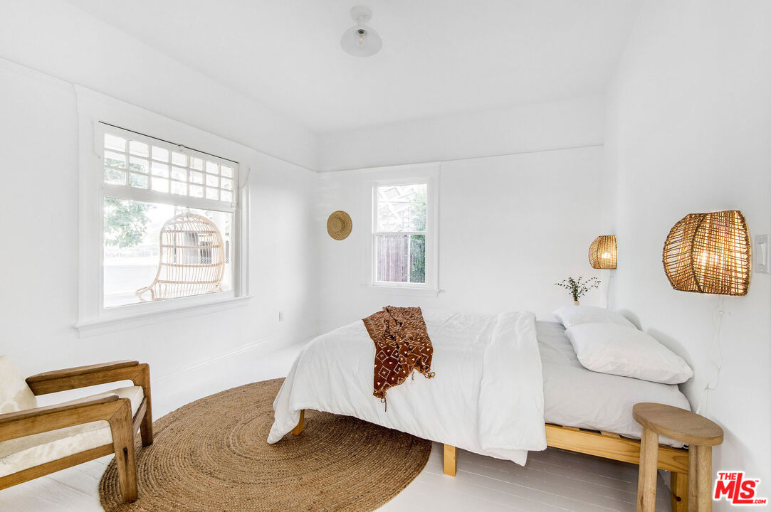 1163 Nelrose Avenue Venice, CA 90291 - Photo 16 of 32 a bedroom with furniture and a window
